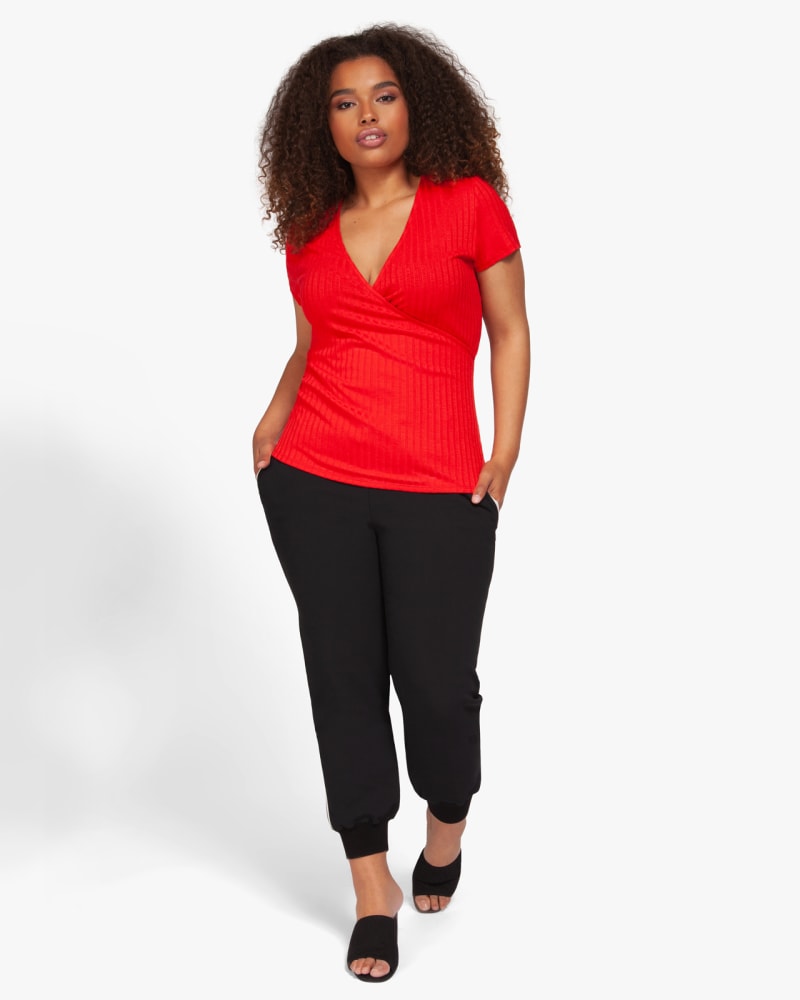 Plus size model wearing Tate Faux-Wrap Ribbed Top by Dex Plus | Dia&Co | dia_product_style_image_id:131601